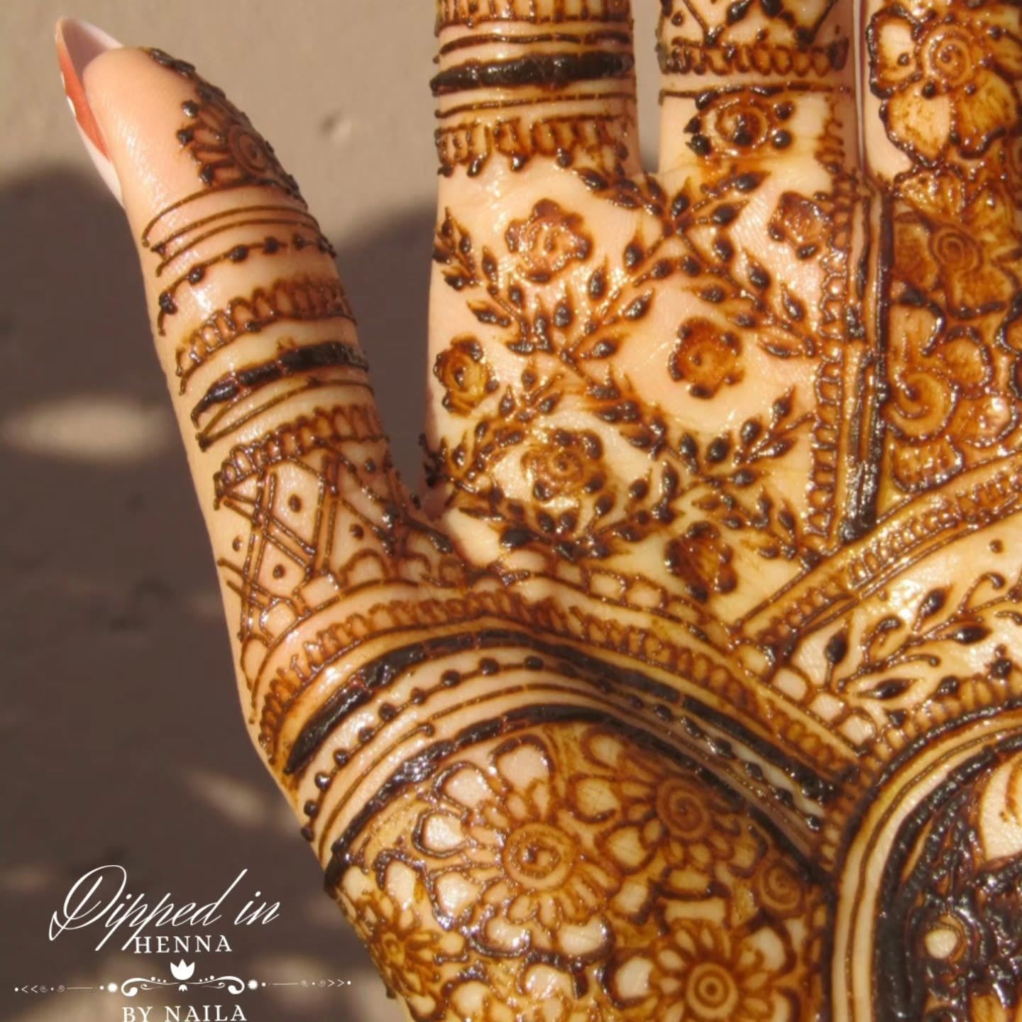 Close-up of an intricate henna palm